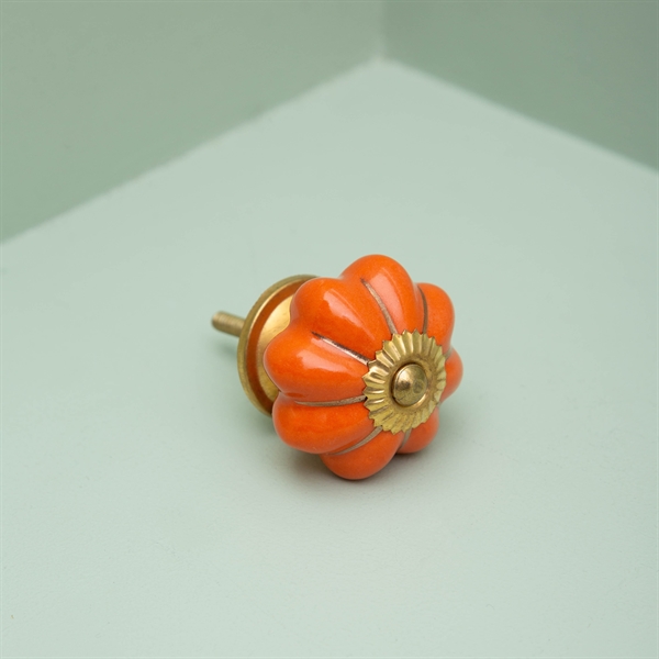 Orange melon knob with gold